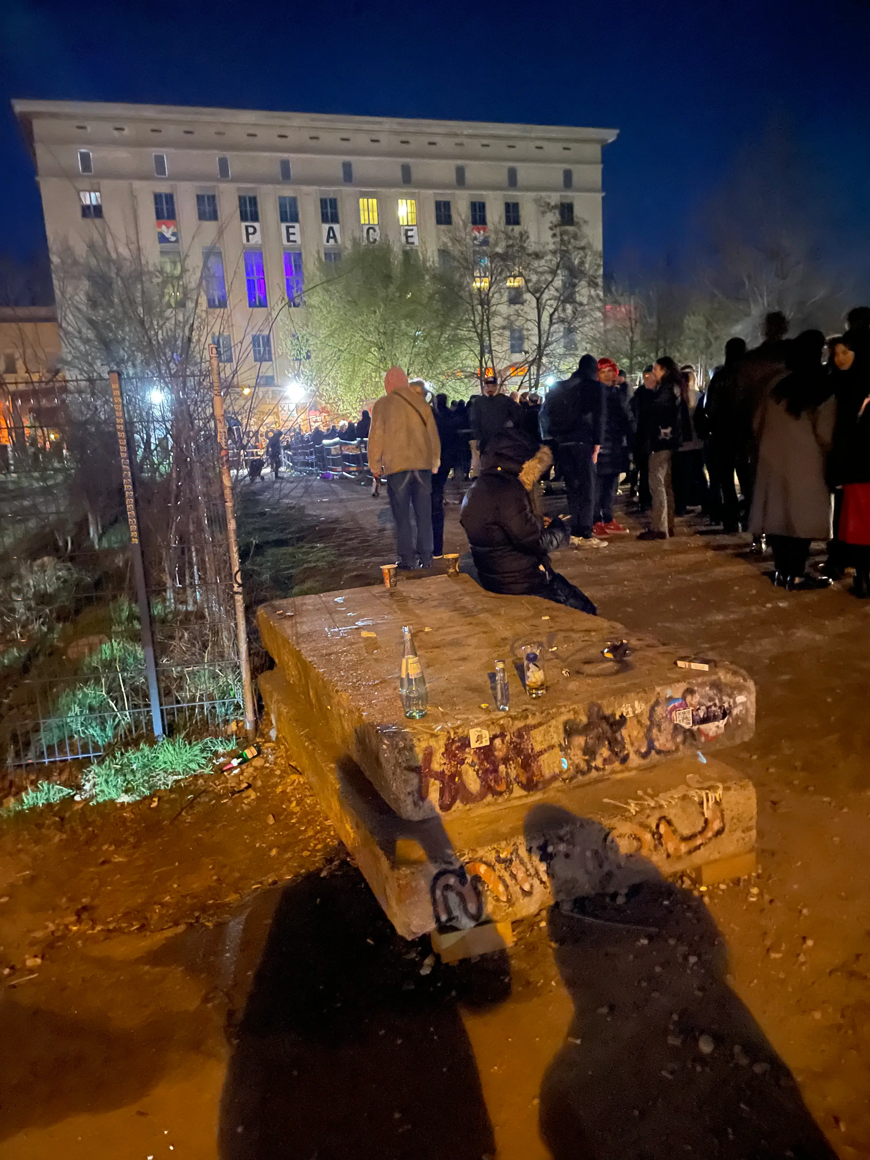 Queue outside Berghain Berlin with crowds lining up for entry to the iconic techno nightclub